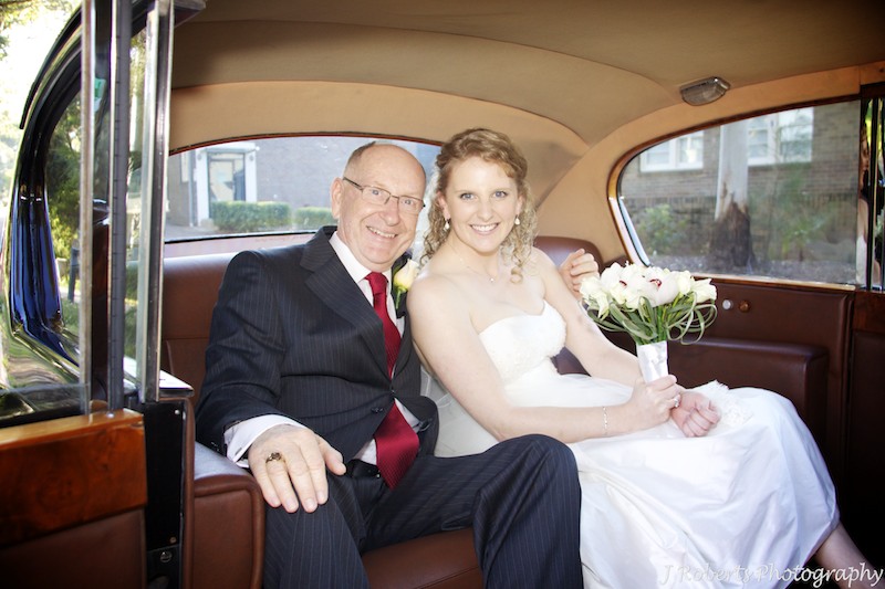 Bride and her father in the wedding car - wedding photography sydney